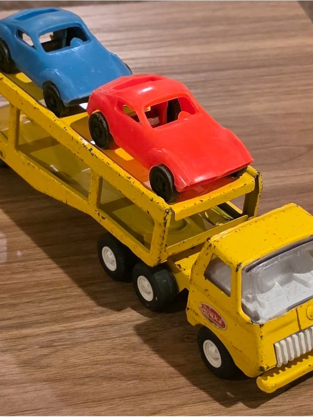 Vintage Tonka Yellow Car Carrier with Red and Blue Toy Cars